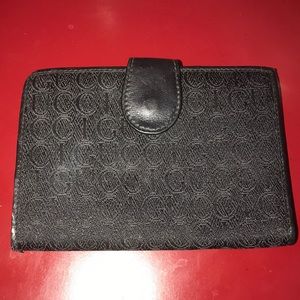Gucci leather wallet.